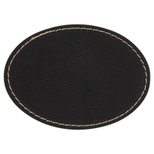 Load image into Gallery viewer, 3 1/2&quot; x 2 1/2&quot; Oval Black/Gold Leatherette Patch with Adhesive